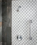 Brantford Oil Rubbed Bronze Posi-Temp Shower Trim Kit With Integrated Shower Head And Lever Handle on tiled wall
