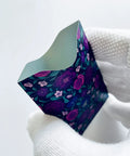 8 RFID Blocking Sleeves With Purple Designs, floral anti theft card protector held in hand, sturdy card sized for wallets.