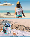 Woman at beach with 30 Can Insulated Cooler Backpack For Travel And Outdoor Adventures With Leak Proof Soft Sided Design, 15L inside view with cans.