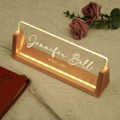 Personalized Light Up Desk Name Plate With Your Name Title Or Motto, acrylic on wooden base, LED glow, reading 'Jennifer Bell'.