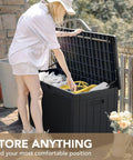 Person opening 100 Gallon Waterproof Resin Deck Box With Lockable Lid For Patio Cushions And Garden Tools, Outdoor Use