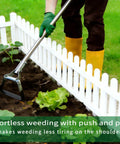 Gardener using Stirrup Hoe Garden Tool With Adjustable Loop Heads For Easy Peasy Weeding in a garden bed, showing ease of use.