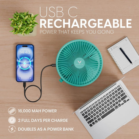 Rechargeable Portable Fan With USB-C, Wireless Battery Operated, 4 Speeds, LED Lighting, Remote Control, shown charging phone