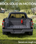 Truck bed with Heavy-Duty Fire Extinguisher Mount For 2.5-5 Lb Dry Chemical Extinguishers installed, anti-vibration bracket visible