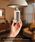 Hand installing Fridge Light Bulbs E26 Base A15 7W LED Equivalent To 60W Daylight White 5000K in a lamp socket