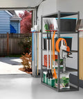 Wall Mount Garden Tool Organizer and Garage Space Saver Storage Rack For Shovels Rakes Brooms Ladders And Folding Chairs shown installed in garage.
