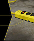 Beefy Metal Surge Protector Strip With Six Outlets And 15 Foot Yellow Cord, lighted switch, grounded design on concrete floor