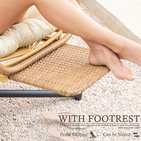 Close-up of footrest on hanging egg chair with stand and footrest for indoor outdoor use, wicker design, beige cushion visible.