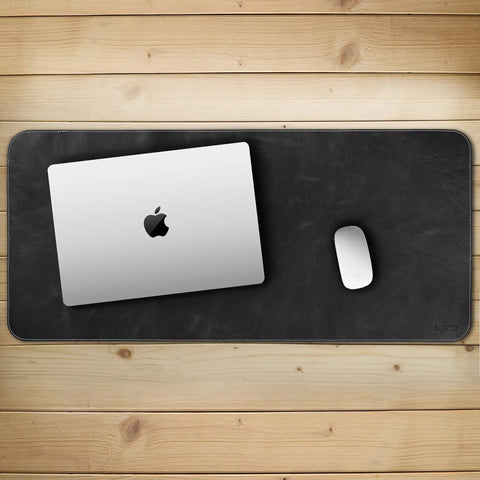 Top Grain Leather Extended Mouse Pad For Office And Gaming Large Desk Mat With slick writing surface shown with laptop and mouse.