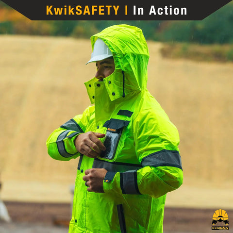 Person wearing Torrent Trench High Visibility Rain Gear 2 Pack Class 3 ANSI OSHA Reflective Hi Vis Jacket Yellow Medium in rain