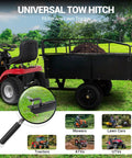 Beefy Heavy Duty Steel Dump Cart For ATVs And UTVs, 1500 Lb Capacity, attached to lawn tractor on grass with mulch.