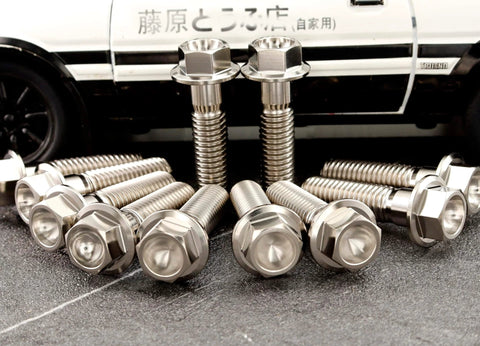 Titanium M6 Flanged Hex Bolts Set, 1.0mm Pitch, Ti 6Al 4V Grade 5 Alloy positioned in front of a model car.