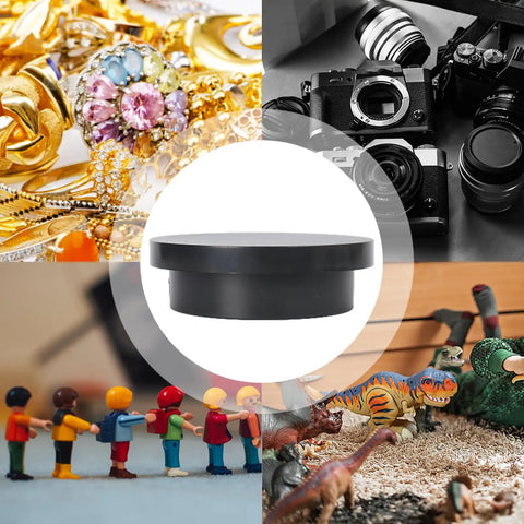 Cool Electric Turntable Display That Spins Your Goods 360 For Amazing Trade Fairs And Photo Shoots Plus It Runs On USB To Keep Things Easy And Green on black base showcasing jewelry, cameras, toys, and models.