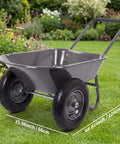 Heavy Duty Garden Wheelbarrow Cart With Dual Wheels And Built In Stand in a garden, gray, with dimensions marked