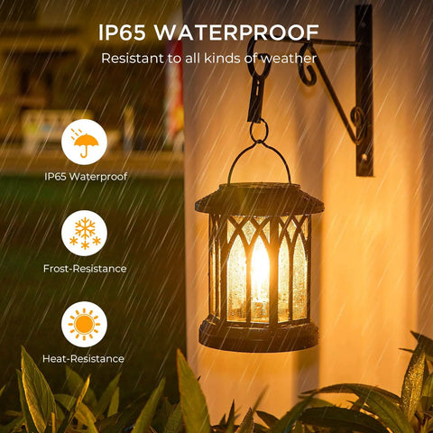 Outdoor Solar Lanterns Waterproof Hanging Lights For Backyard with IP65 rating in rain, shown glowing on a hook against a wall.