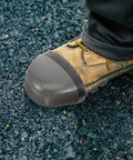 Close-up of a boot with Steel Toe Shoe Covers With Durable Anti Smashed Steel Toe Caps For Boots Universal Fit Easy Slip On