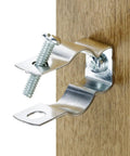 Rock Solid 3/4 Inch EMT Conduit Hangers 20 Pack With Bolts zinc plated insulated pipe clamp mounted on wood surface.