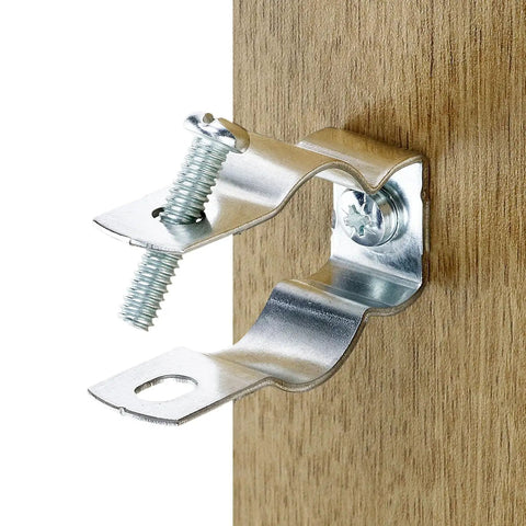 Rock Solid 3/4 Inch EMT Conduit Hangers 20 Pack With Bolts zinc plated insulated pipe clamp mounted on wood surface.