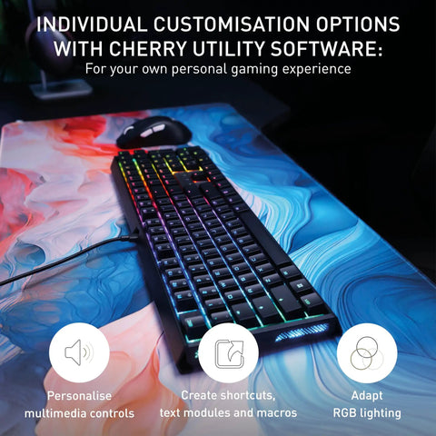 Badass Wired Gaming Keyboard Featuring Rock Solid Aluminum Chassis And Ultra Smooth Mx2A Brown Switches For Next Level Action and glowing RGB backlighting on a colorful mousepad.