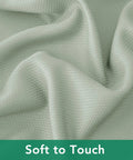 Close-up of sage green fabric texture for 54x54 Inch Sage Square Tablecloth, Linen Like, Water Resistant And Washable
