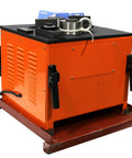 Pro Grade Hydraulic Electric Rebar Bender Built Like A Tank To Bend Steel Rods At One Eighty Degrees With Swappable Rollers Handling Six To Thirty Two Millimeter Bars For Contractors Wanting Zero Hassle, showing orange machine with handles and rollers.