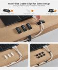 Dope 316 Piece Cable Management Organizer Kit with cable clips organizing desk wires neatly under a laptop.