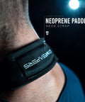 Close-up of neoprene padded neck strap on Arm Blaster For Bigger Biceps With Thick Aluminum Build Contoured Padded Edges Adjustable Elbow Posture Support Isolates Curls For Serious Arm Gains Weightlifting And Bodybuilding Essential Black.
