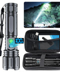 Rechargeable 2000 Lumens LED Flashlight With Long Beam Power Display IPX5 Waterproof 20 Hour Runtime 5 Modes Zoomable Handheld Light For Camping And Outdoors Beast Bright Ultra Durable Easy To Use, shown with accessories and case.