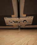 Close-up of galvanized steel fasteners from Never Let Your Couch Budge An Inch Again With These Heavy Duty Interlocking Sectional Sofa Connectors 6 Pack.