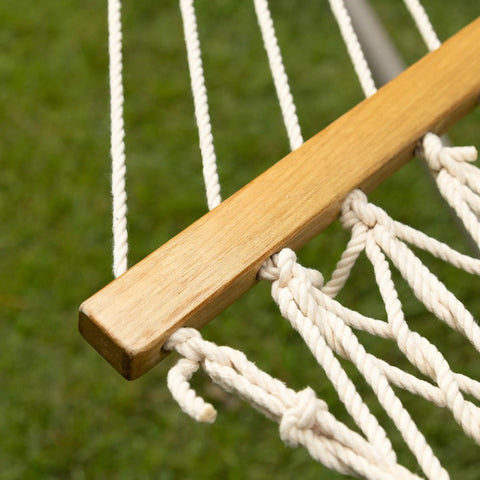 Close-up of hardwood spreader bar in 13 Ft Double Cotton Rope Hammock For 2 450 Lb Capacity Free Extension Chains And Tree Hooks