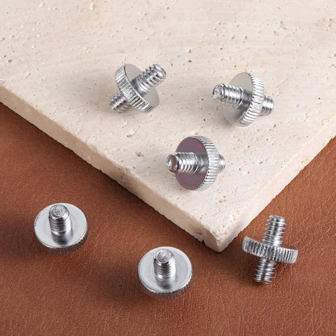 Six Pack 1/4 Inch Male To Male Threaded Adapter Screw Extender For Camera Cage And Light Stand Hella Durable Knurled Alloy Grip on a surface.