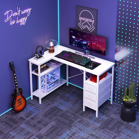 White L Shaped Desk With Shelf Drawers 47 Inch Corner Computer Desk For Gaming And Study With Power Outlet in bedroom setup