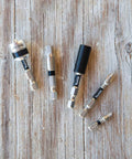 Three Piece Impact Ready Two Inch Square Socket Adapter Set with chamfered edges and retention ball on wooden background