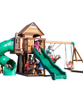 Children playing on Cedar Cove Wooden Swing Set With Spiral Tube Slide And Wave Slide, Elevated Clubhouse With Balcony