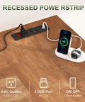 Recessed power strip with four AC outlets and two USB ports on wooden desk, ideal for No Sweat 66 Inch Farmhouse L Shaped Standing Desk.