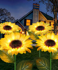Upgraded 4 Flower Solar Sunflowers With Fairy Light Petals For Yard Decor illuminating a yard at night