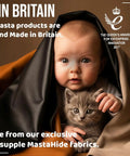 Baby and cat wrapped in MastaPlasta fabric, Made in Britain, showcasing soft MastaHide materials with award logos visible.