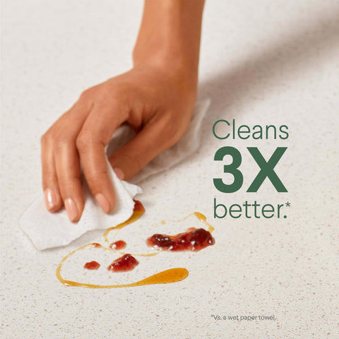 Hand cleaning a countertop with Allergy Season Disinfecting Wipes Bleach Free Multi Surface Cleaner Antibacterial Fresh Scent