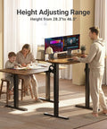 Family using Electric Adjustable Standing Desk For Home Office With 24 By 48 Inch Workspace Sit Stand Design Splice Board Top Black Frame