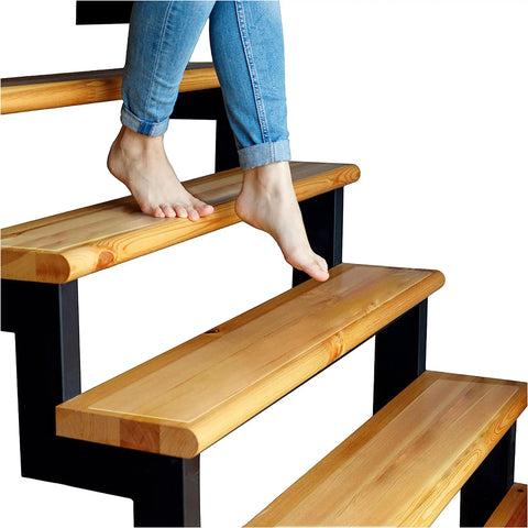 Bare feet on wooden stairs, showcasing Clear Non Slip Carpet Stair Treads For Wooden Steps 15 Pack 30 By 8 Inches Peel And Stick Slip Resistant Mats Indoor Outdoor Safe Traction For Stairs And Runners.