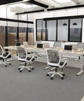Straight Up Solid Manual Height Adjustable Standing Desk With Smooth Glide Lift Handle And Spacious Storage Drawer Modern Minimalist PC Computer Workspace Built For Home Office Gaming Or Study Prime 1 Meter Wide Setup in an office setting with multiple desks.