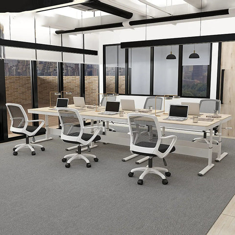 Straight Up Solid Manual Height Adjustable Standing Desk With Smooth Glide Lift Handle And Spacious Storage Drawer Modern Minimalist PC Computer Workspace Built For Home Office Gaming Or Study Prime 1 Meter Wide Setup in an office setting with multiple desks.