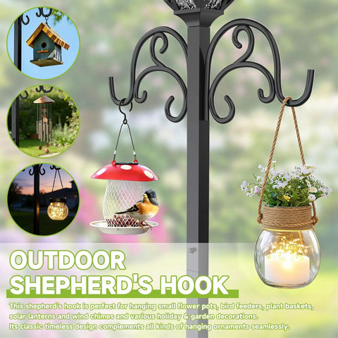 3-In-1 Garden Hose Holder With Solar Light And Shepherd Hooks featuring bird feeder and hanging light in use outdoors