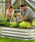 Family gardening with Tough Oval Galvanized Raised Garden Bed For Outdoors, Open Bottom Metal Planter Box, 4x2x1 ft in backyard.