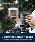 One Touch Automatic Espresso Machine With Integrated Grinder And Smart Milk Frother In Sleek White showing 2 removable bean hoppers with coffee beans.