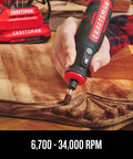 Person using Cordless Rotary Tool With Variable Speed Dial For Precise Finishing From 6,700 To 34,000 RPM on wooden surface