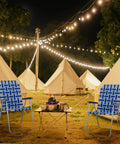 Set Of 2 Portable Folding Lawn Chairs For Patio Or Beach Use, Webbed Seats With Higher Backrests at a campsite at night