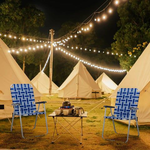Set Of 2 Portable Folding Lawn Chairs For Patio Or Beach Use, Webbed Seats With Higher Backrests at a campsite at night