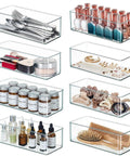 8 Pack Deep Drawer Organizers For Kitchens Closets And Bathrooms Super Solid Storage Bins set holding cutlery, cosmetics, and accessories.