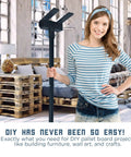 Woman holding Deck Wrecker Pallet Breaker Tool For Quick Pallet Teardown And Deck Board Removal in a workshop setting.
